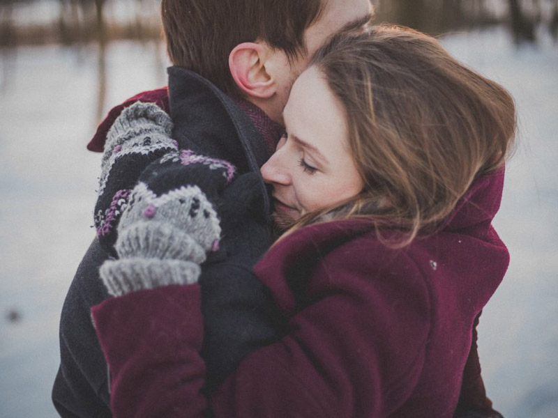 Couple hugs each other