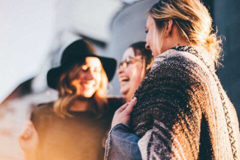 Three girls smiling